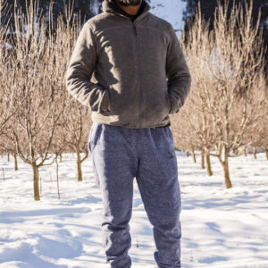 Puneet against the backdrop of the apple orchard